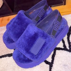 UGG slippers , size 9 in womens and 7 in mens. There purple and Comfortable!!!